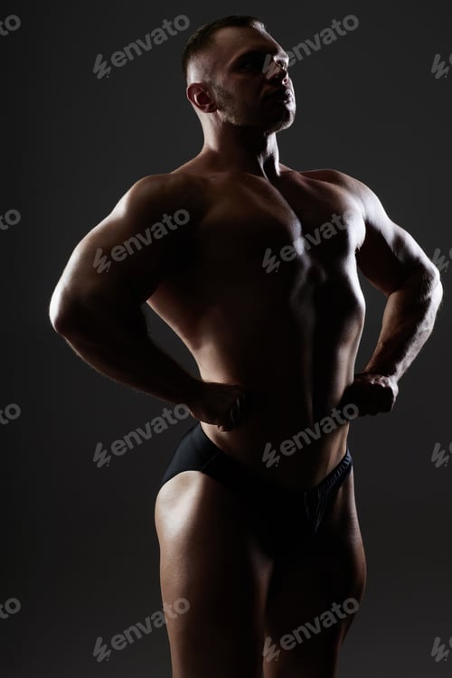 Preview: Male Bodybuilder Flexing Chest And Shoulder Musculature