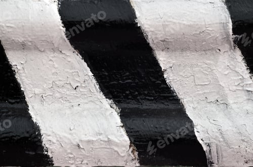 Preview: Close-up view of a metal barrier with striped color