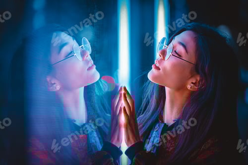 Preview: Pretty asian woman portrait with led lights