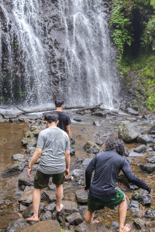 Preview: Adventurous Young Men Explore Stunning Waterfall On Refreshing Summer Day Together