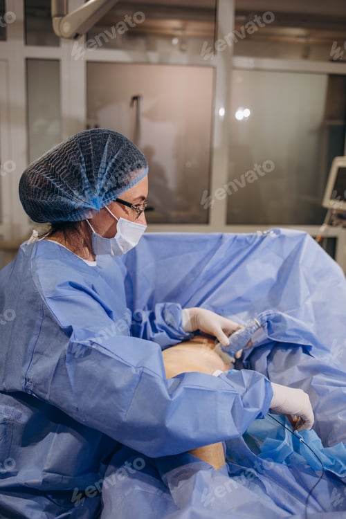 Preview: Surgeon Performing Procedure in Sterile Operating Room