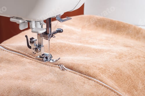 Preview: Modern Sewing Machine Special Presser Foot With Beige Fabric And Zipper, Closeup