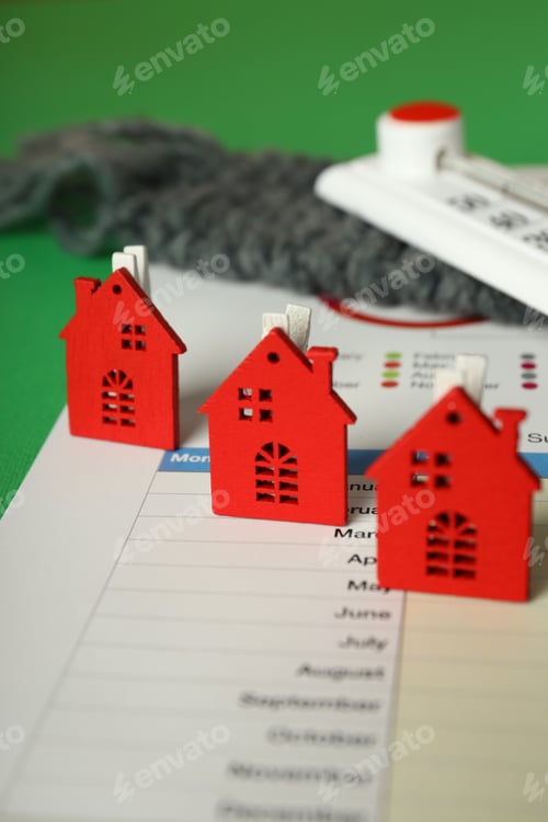 Preview: Concept of heating season on green background