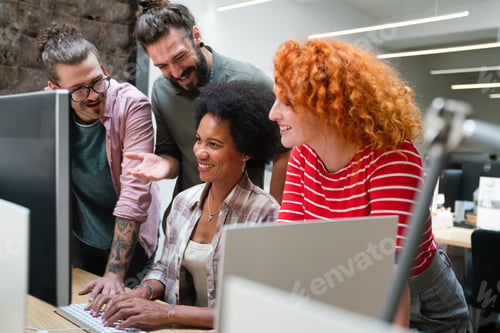 Preview: Smiling diverse colleagues gather in boardroom brainstorm discuss financial statistics together