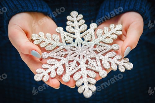 Preview: Closeup girl hands with New Year