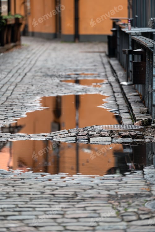 Preview: Cobblestone - old street in Riga. A view just after rain.