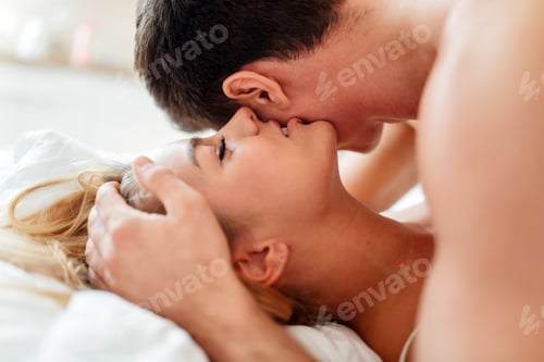 Preview: Happy couple in bedroom
