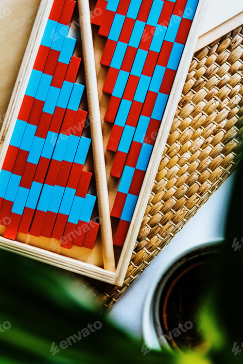 Preview: Red and blue montessori wood stripe to learn arithmetic in class.