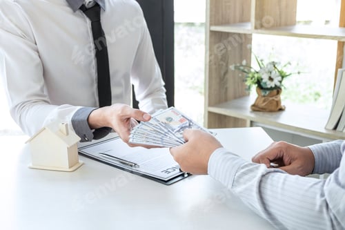 Preview: Business Deal Involving Money and a Model Home