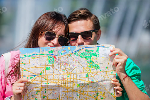 Preview: Young tourist friends traveling on holidays in Europe smiling happy. Closeup caucasian family with