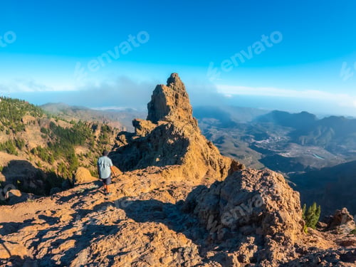 Preview: A male tourist at Pico de las Nieves in Gran Canaria, Canary Islands
