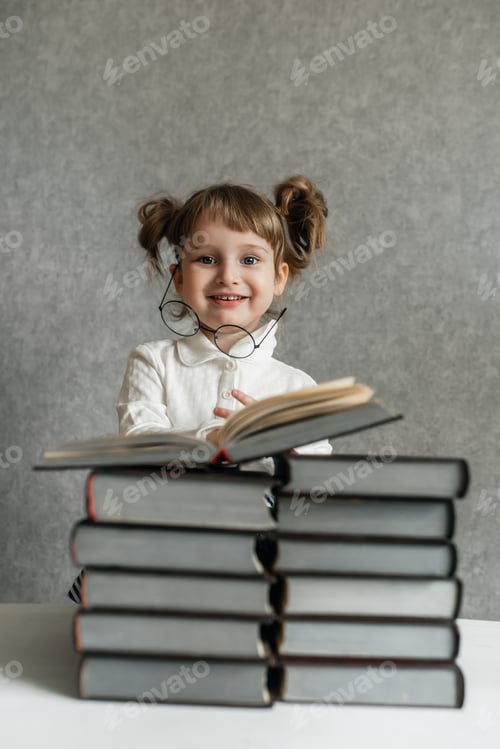 Preview: Baby girl, reads, books, school, textbooks, pupil, glasses, funny, emotional, learning