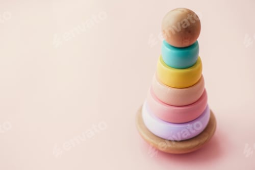 Preview: Stylish wooden toy for child on pink background