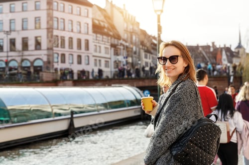 Preview: Portrait young beautiful happy smiling woman wear wool tweed coat enjoy walk canal river embankment