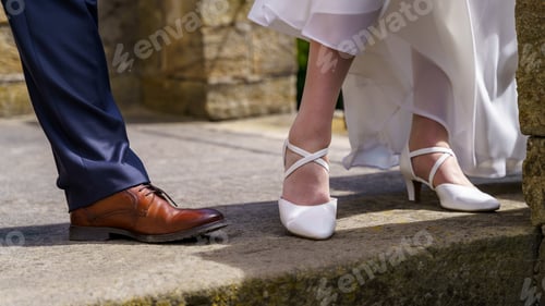 Preview: Feet with shoes of bride and groom - wedding shoes