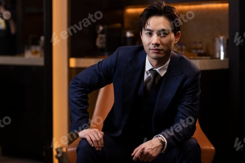Preview: Portrait of elegant Chinese businessman