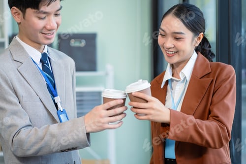 Preview: Happy creative people descent holds a cup of coffee and talking discussion ideas and happily.
