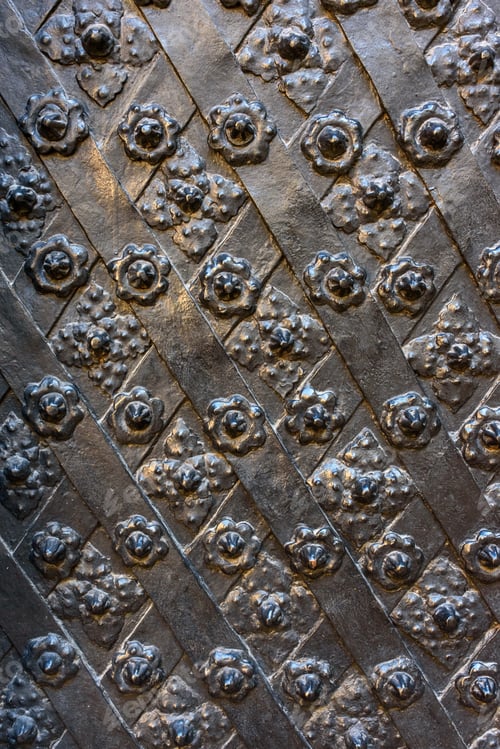 Preview: Black forged door, rhombus symmetrical texture. Grunge black background