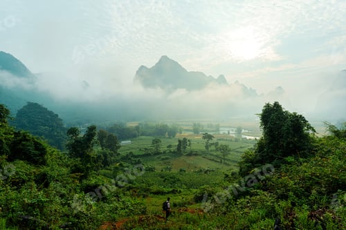 Preview: Lush forest with foggy mountain in Phong Nam Valley at the morning