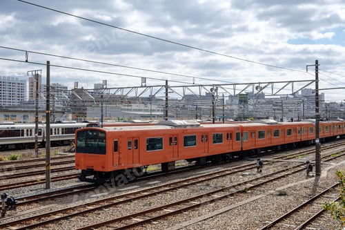 Preview: Vintage locomotive orange train in station