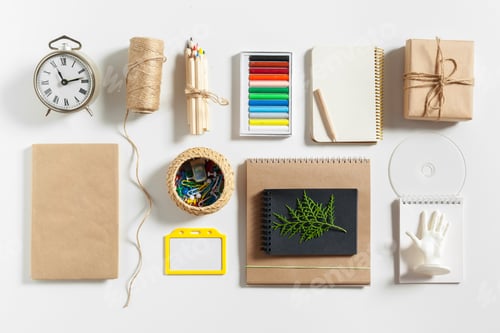Preview: Various items on a table for organization and creative activities in a workspace