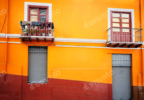 Preview: Street view of an old building facade with windows, architecture background, Quito, Ecuador.