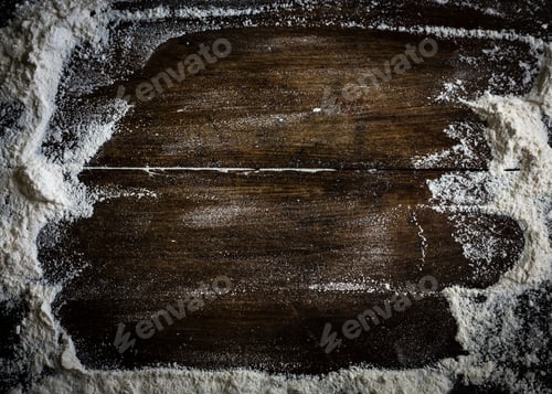 Preview: Flour scattered on a wooden table