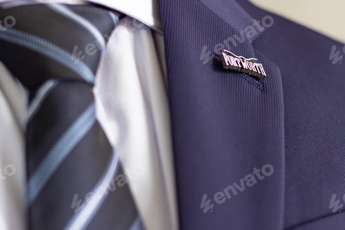 Preview: Fort worth pin badge on business suit lapel