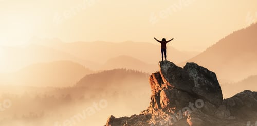 Preview: Adventurous Woman Hiking on the Rocky Coast with Mountains and Dramatic Sunset Sky.