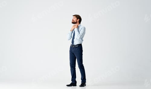 Preview: business man in shirt with tie emotions gestures with hands light background