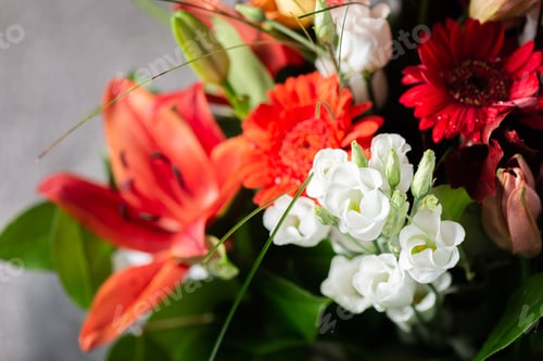 Preview: Vibrant Bouquet of orange Asiatic lilies and other flowers