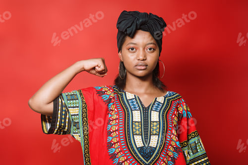Preview: Black teenager looking seriously at the camera