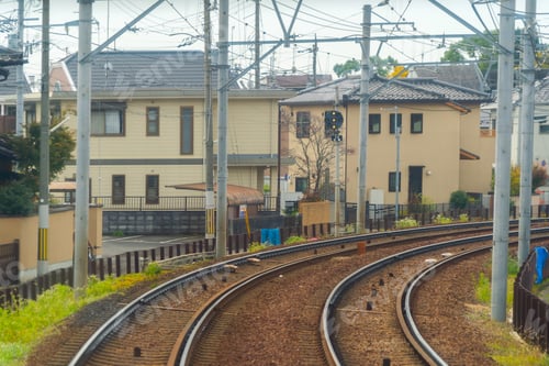 Preview: Japanese railway with a local train run through city. Tourist attraction