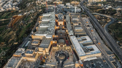 Preview: Aerial shot of Mater Dei Hospital in Malta surrounded by other buildings
