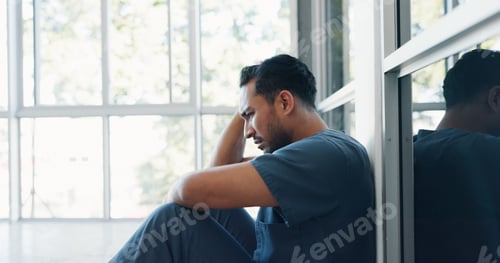 Preview: Nurse, stress or depression man on hospital floor in virus death, surgery fail or patient loss grie