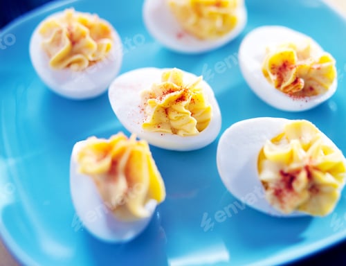 Preview: deviled eggs on colorful blue plate