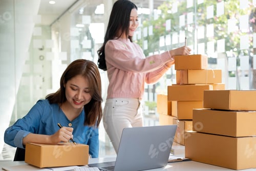 Preview: Portrait of Starting small businesses SME owners, two Asian woman check online orders Selling