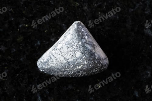 Preview: sample of tumbled skutterudite mineral on black