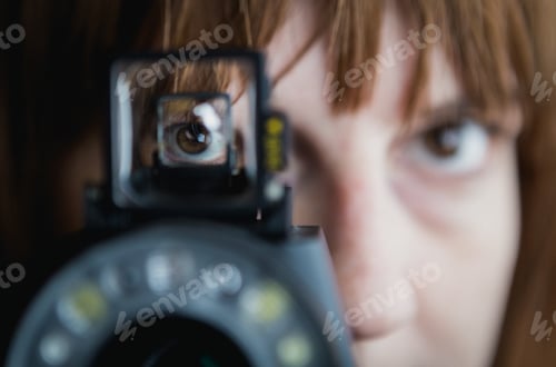 Preview: Woman's Eye in Viewfinder