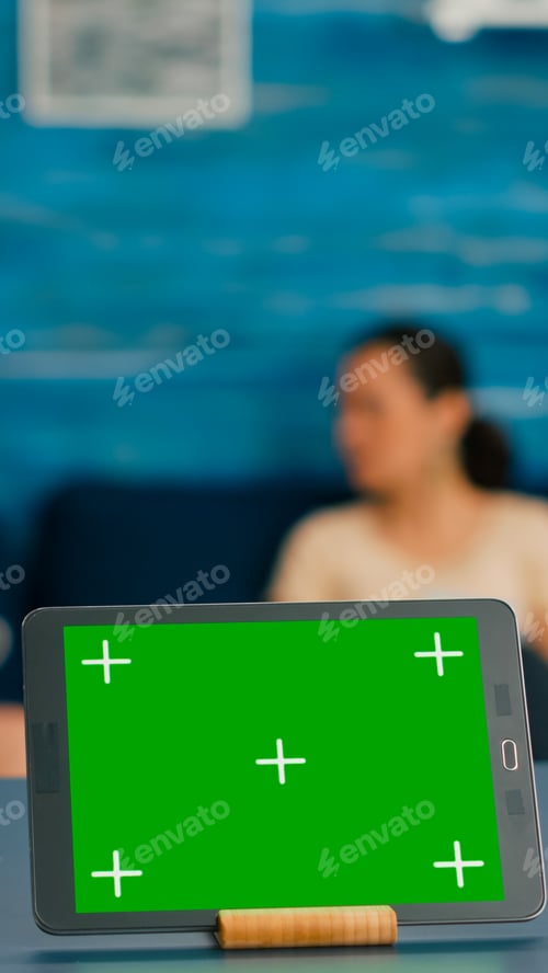 Preview: Isolated digital tablet with mock up green screen chroma key display
