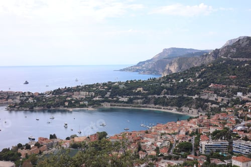 Preview: Picturesque view of city, sea and boats under beautiful sky with clouds
