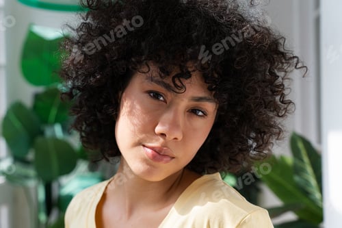 Preview: Beautiful latino woman at home