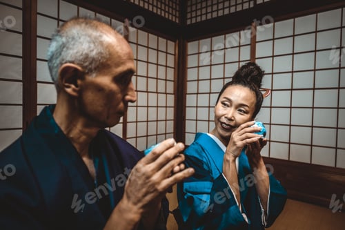 Preview: Senior japanese couple moments in a traditional house