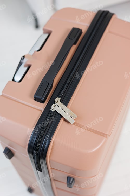 Preview: A beautiful pink suitcase for tourist trips. High-quality pink suitcase for things.