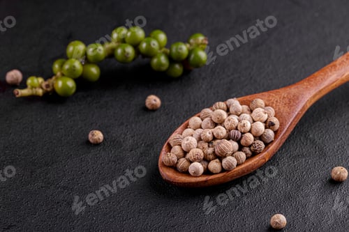 Preview: pepper in bow on wooden table