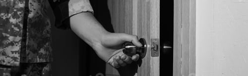 Preview: partial view of serviceman opening entrance door while coming back home, banner