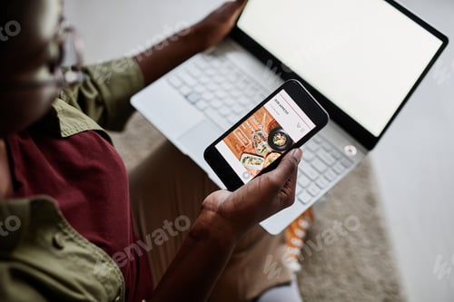 Preview: Young Black Woman Using Food Delivery App
