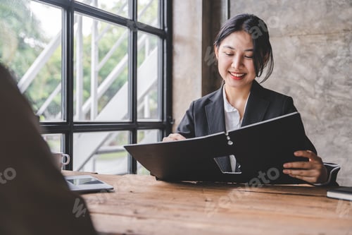 Preview: Portrait of a person interviewing for a job and
Submit resume to staff job application concept