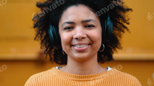 Preview: Black woman, portrait or music headphones on isolated yellow background, fashion mockup or wall moc