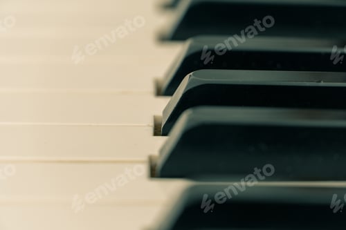 Preview: Closeup shot of piano tiles on a blurred background